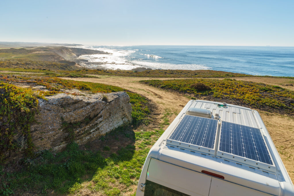 Solar panels on top of an traveling RV. 