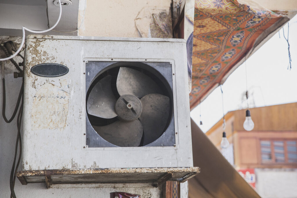 broken dirty air conditioner on the home in Africa