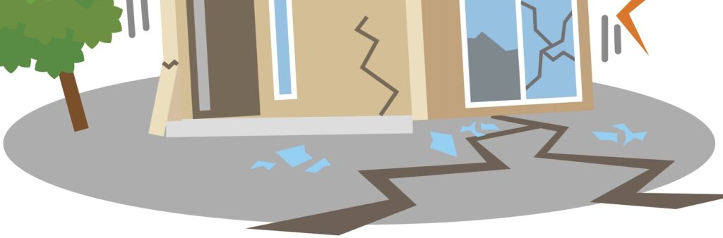 A clipart of a house whose foundation has been cracked by an earthquake.