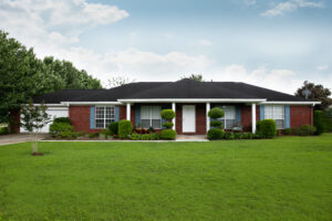 A ranch home from the front yard.