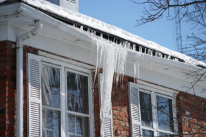 A gutter damaged by frozen water.