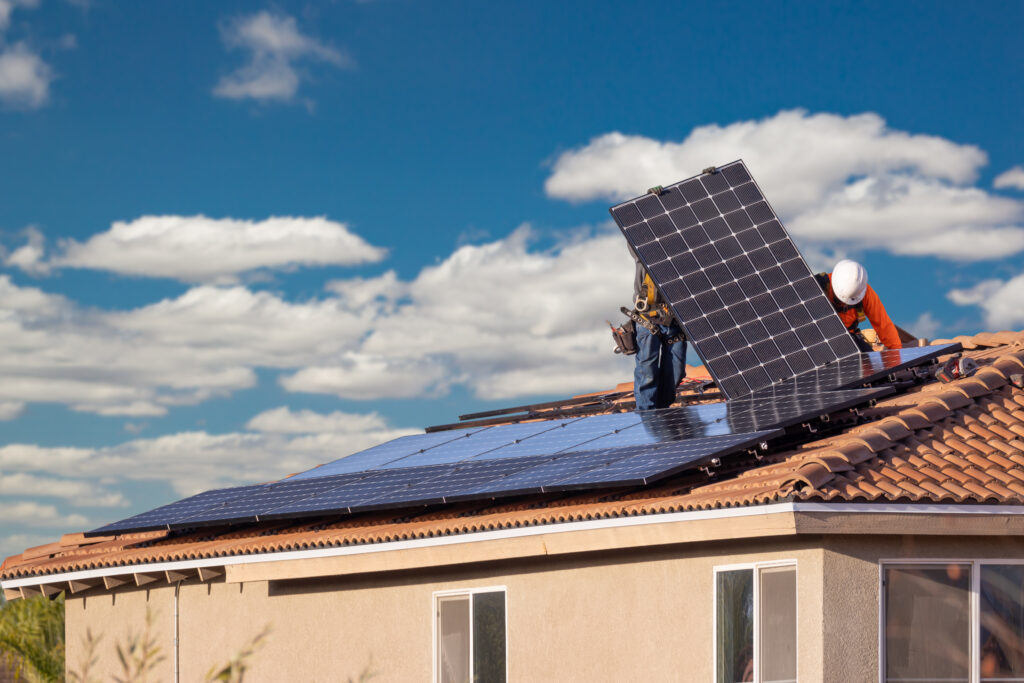 A solar panel installation in progress on a California roof.