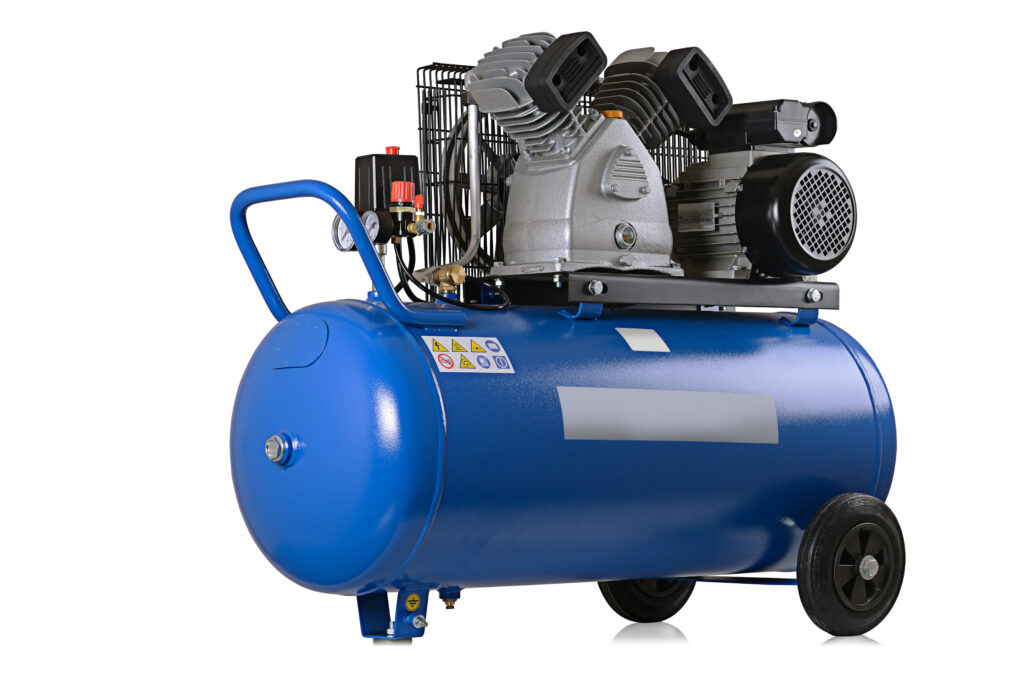 New air compressor on a white background, similar to that used in an HVAC unit.